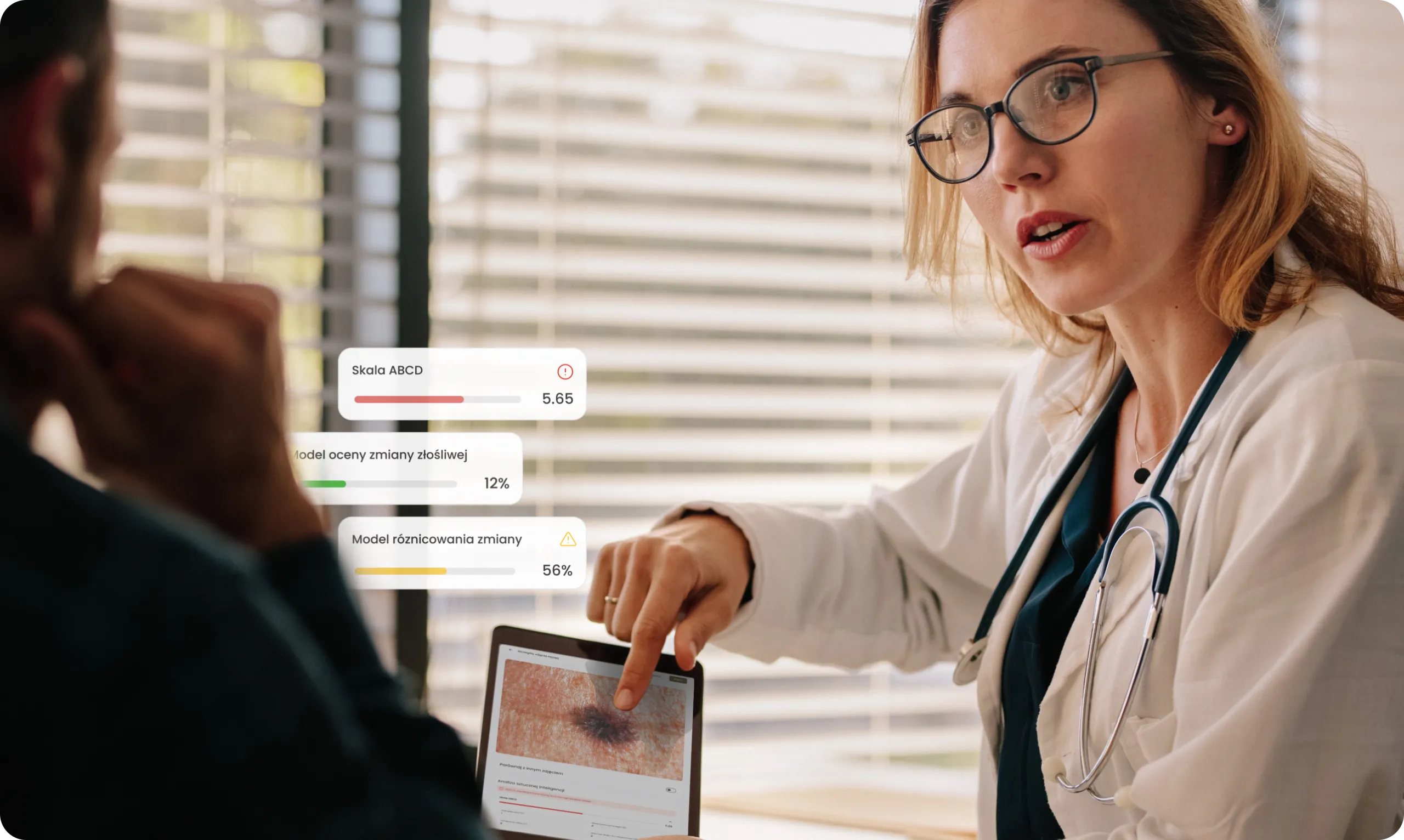 Doctor discussing an examination result with a patient on a tablet